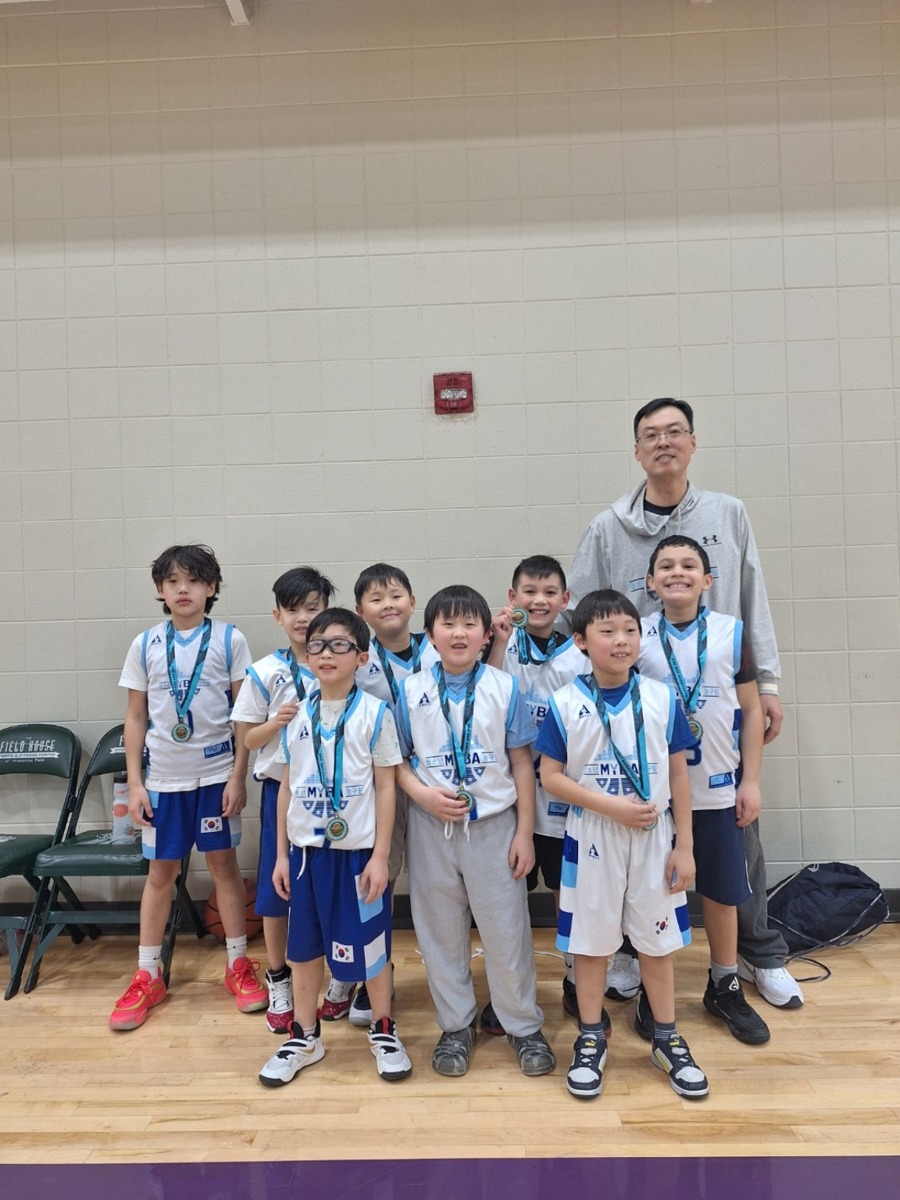 Younger MYBA players with Coach Mark